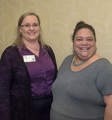 two women smiling